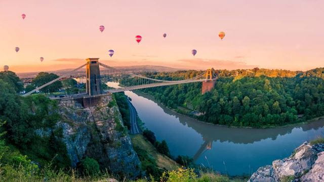 Balloons fly over the Clifton Suspension Bridge